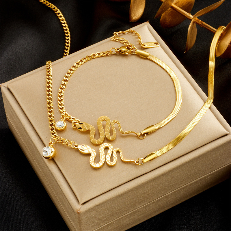 Fashionable, niche, and subtly luxurious design: High-end women's titanium steel bracelet and necklace with gold-plated snake-shaped pendant jewelry set.