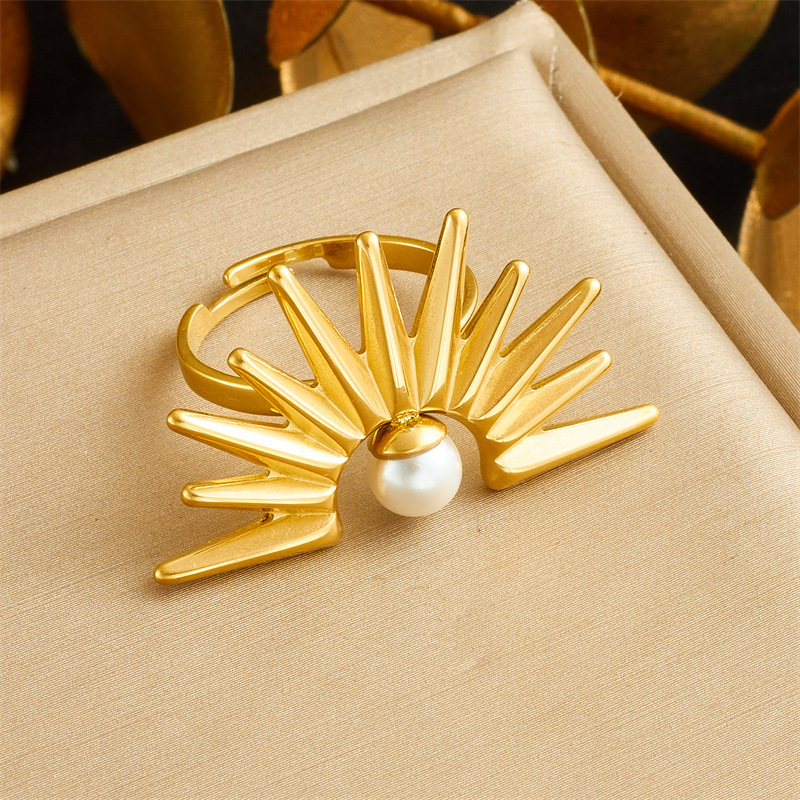 European and American style retro sunflower pearl pendant clavicle chain stainless steel necklace, earrings, and ring three-piece set