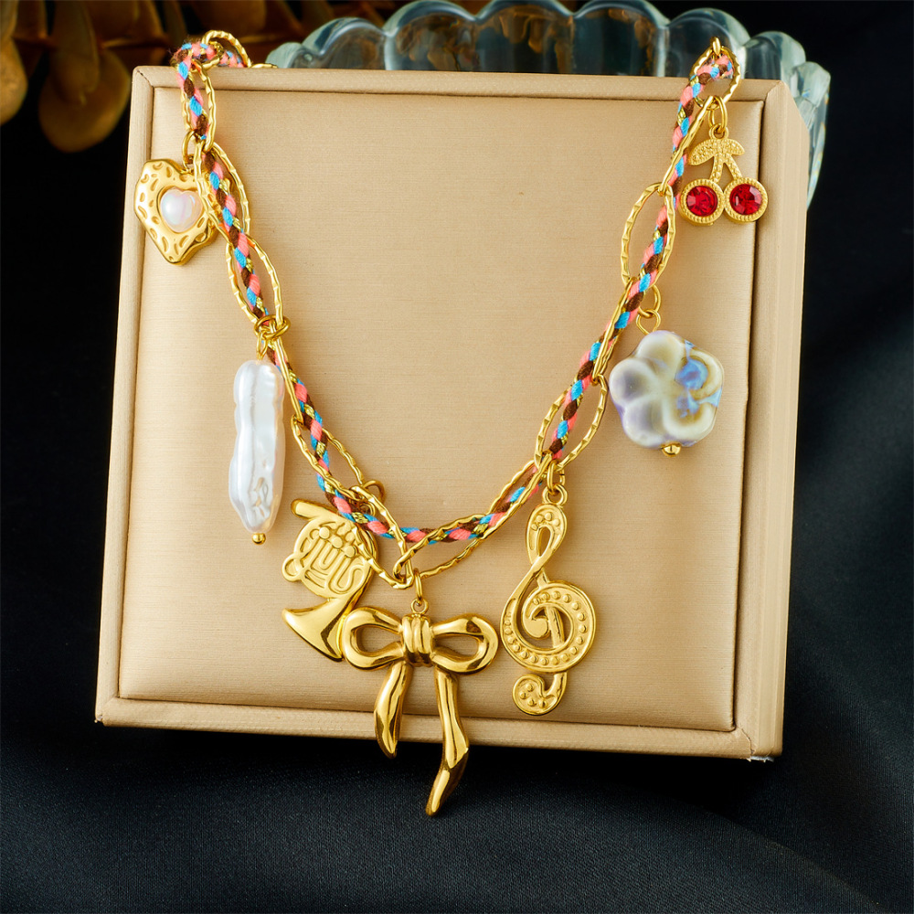 Cross-border fashion gold-plated musical note bow heart pendant chain colorful woven rope stainless steel metal necklace