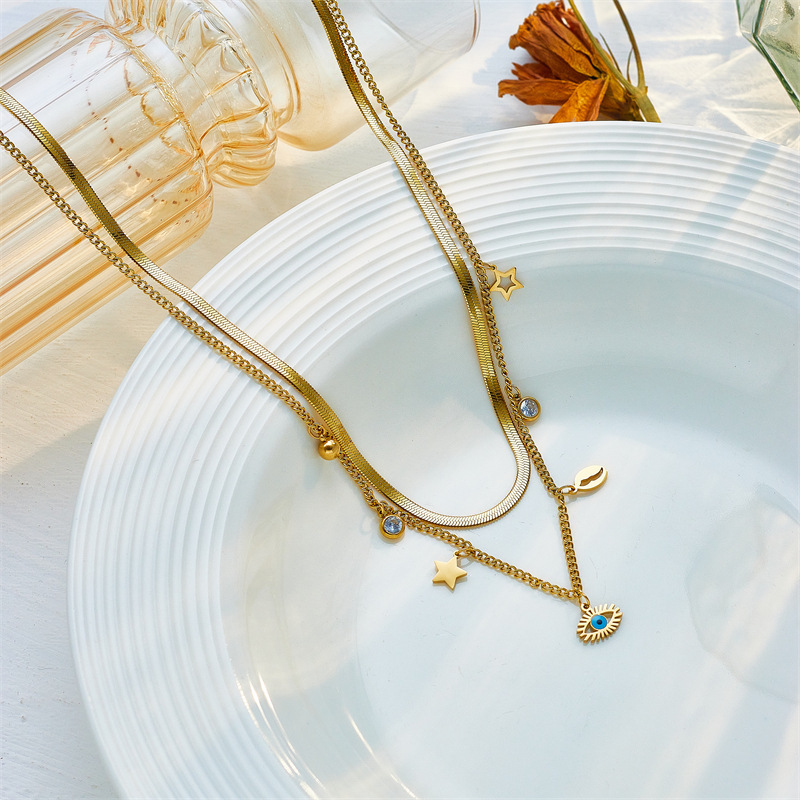 European and American cross-border fashion jewelry, double-layered stainless steel star and shell hollow eye pendant collarbone necklace.