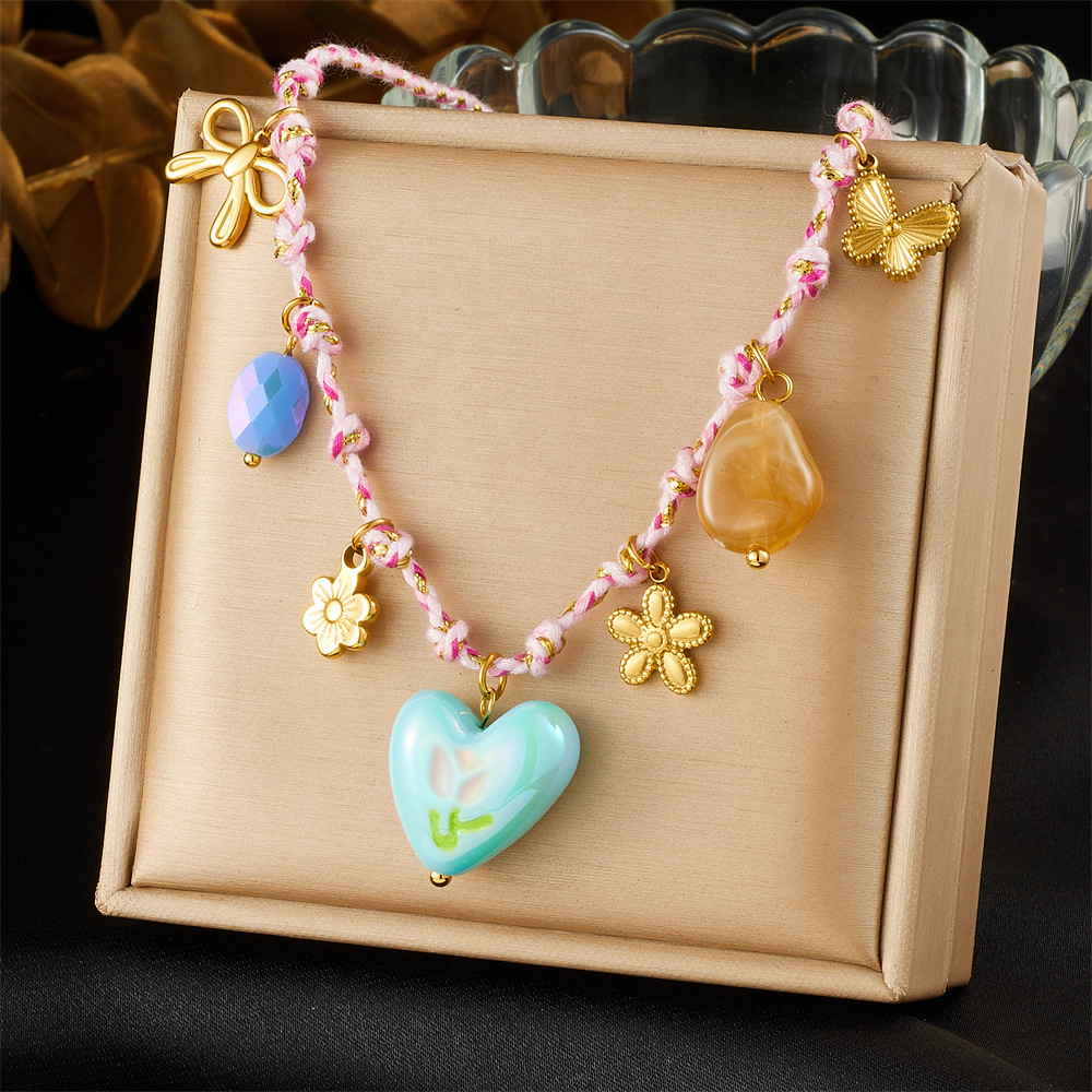 Korean style new creative fashion color-blocked woven rope knotted stainless steel flower sun heart drip print necklace