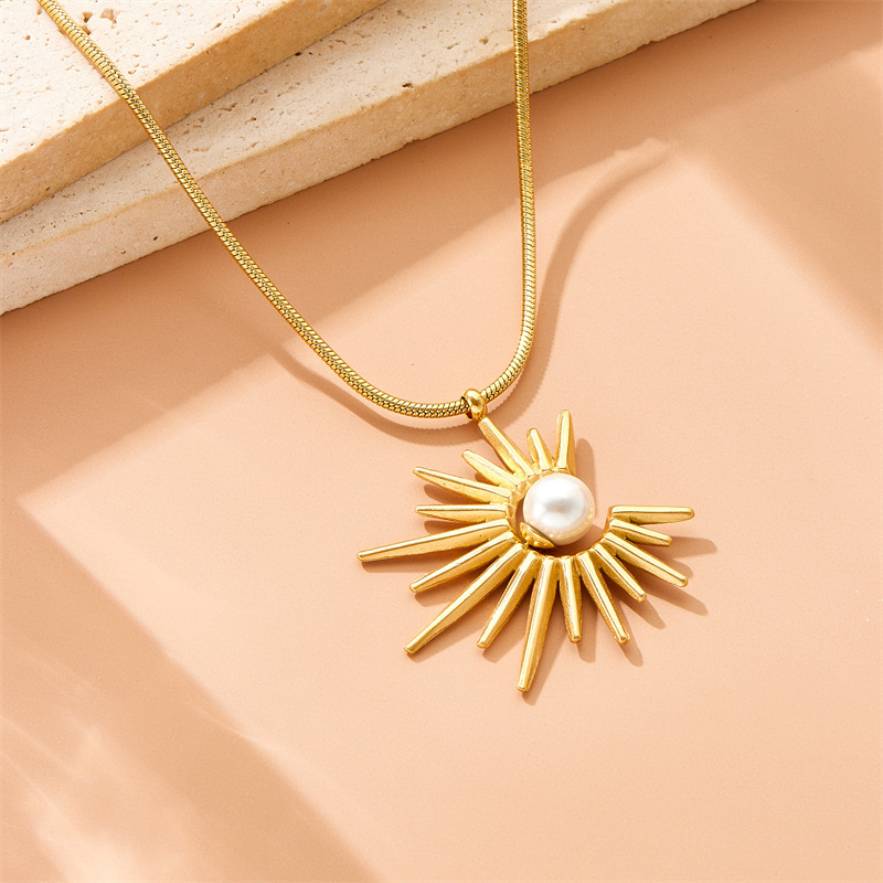 European and American style retro sunflower pearl pendant clavicle chain stainless steel necklace, earrings, and ring three-piece set