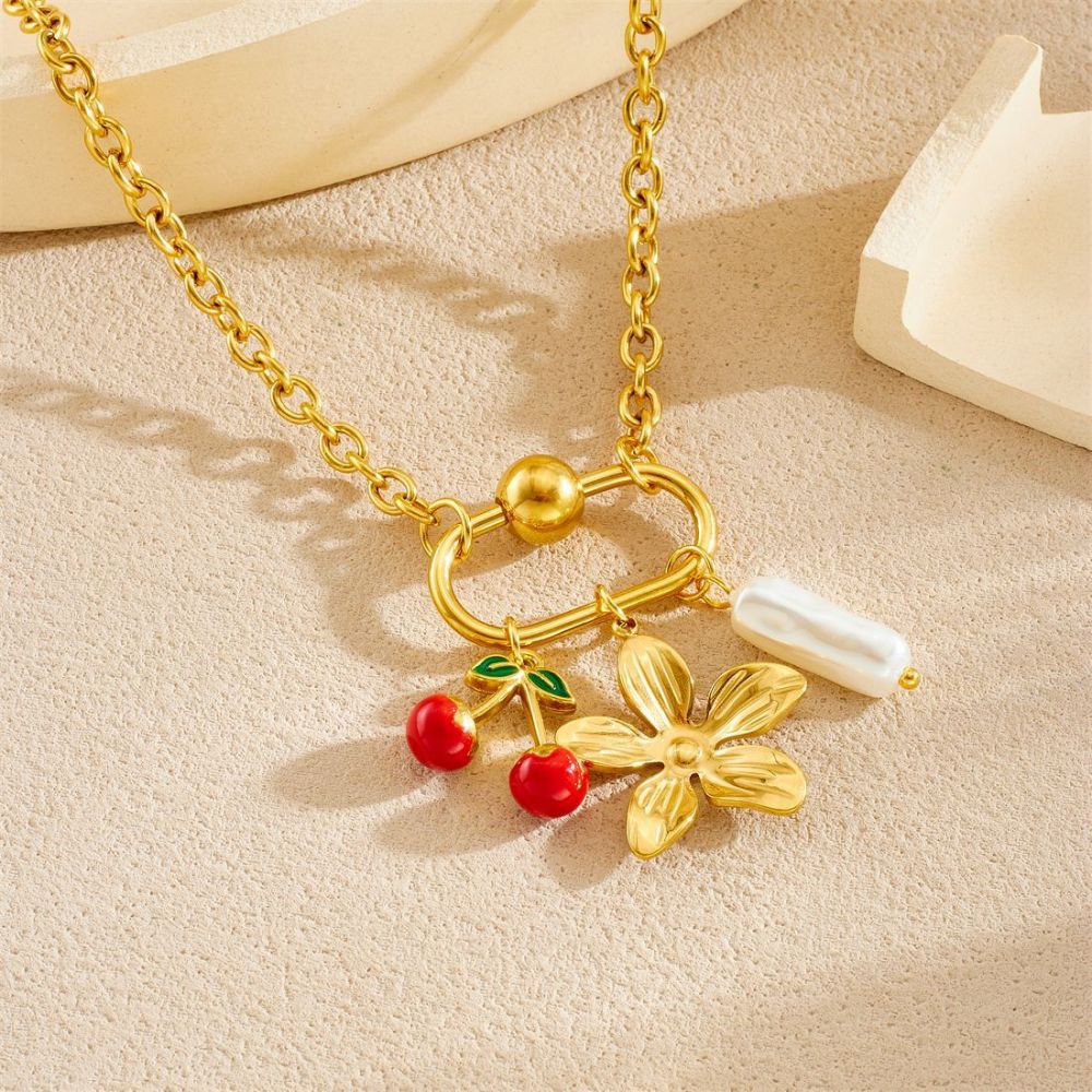 Niche design gold-plated cherry fruit and marine life pendant, gold-plated starfish, seashell, and flower accessory necklace.