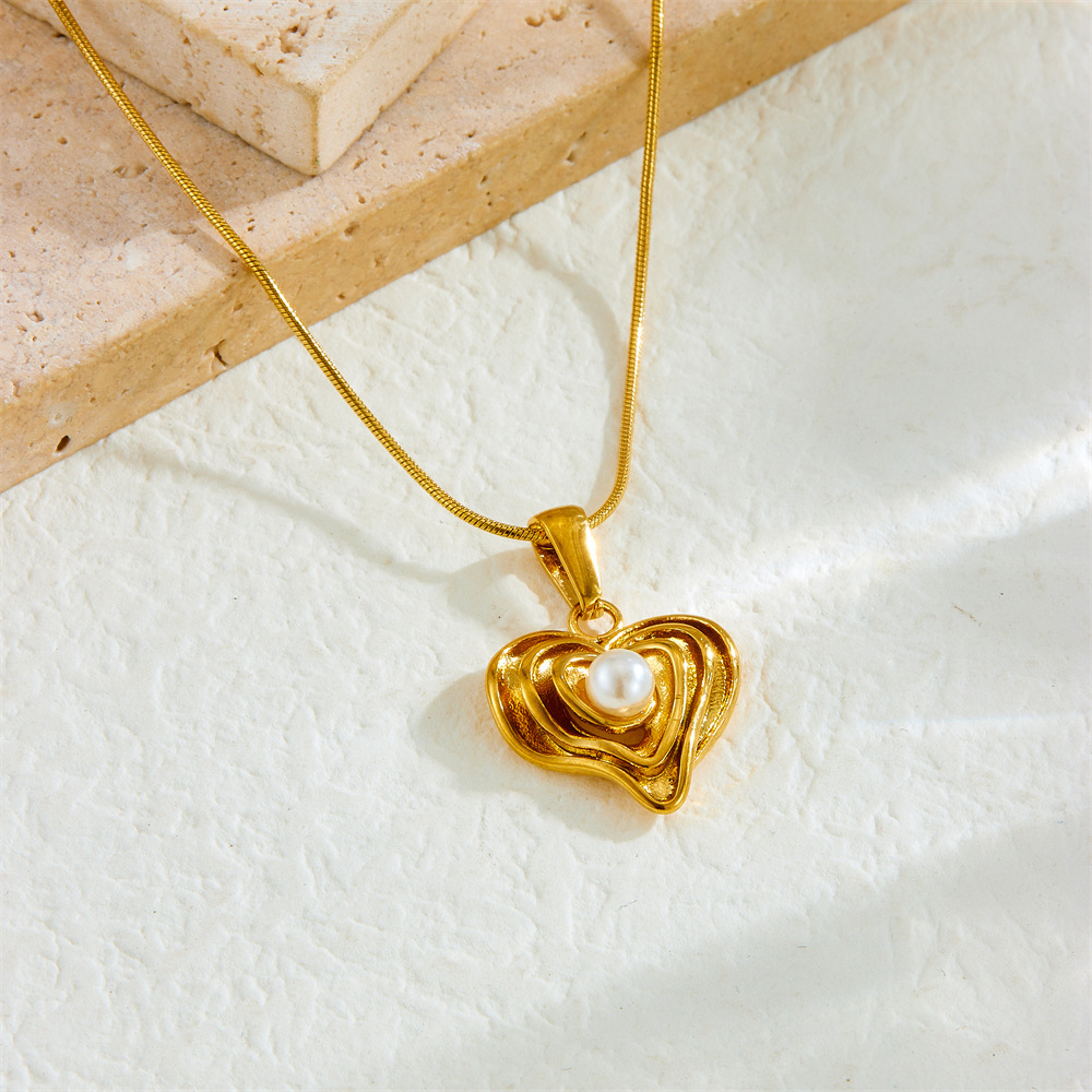 European and American style gold-plated simple and versatile irregular heart pearl pendant snake chain stainless steel jewelry necklace