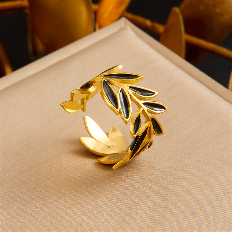 European and American style retro stainless steel black leaf gold-plated earrings, rings, necklaces, jewelry set