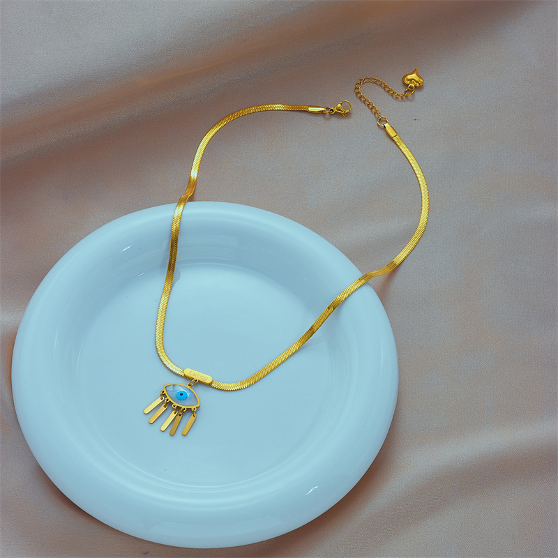 European and American cross-border retro niche fashion high-end U-shaped snake bone chain titanium steel blue eye tassel pendant necklace