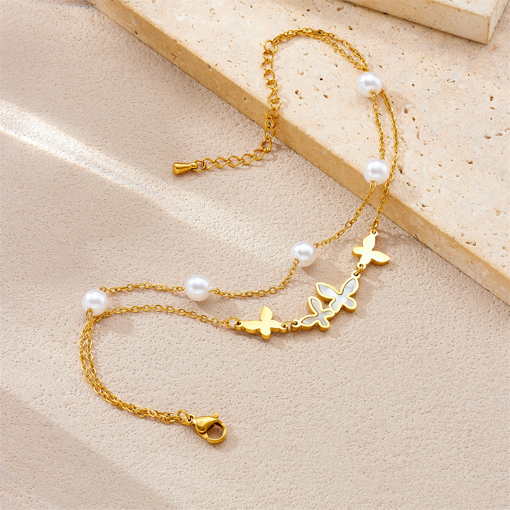 Niche minimalist retro layered double pearl butterfly pendant stainless steel gold-plated jewelry women's anklet
