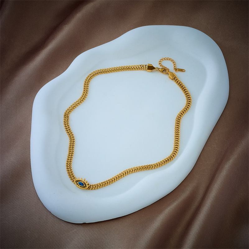 New European and American cross-border minimalist creative personalized hollowed-out blue eyes titanium steel metal chain hip-hop necklace