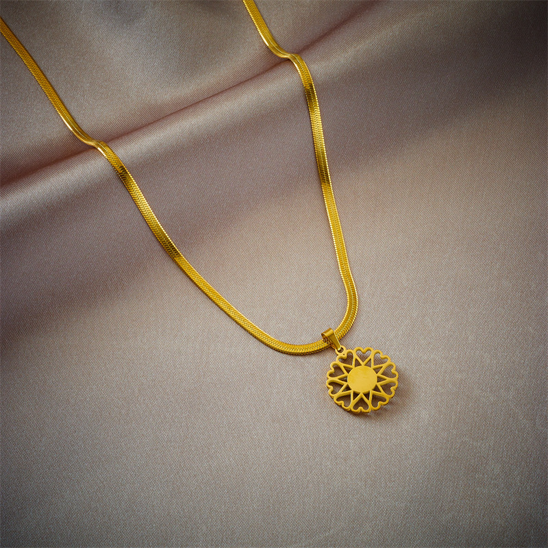 New European and American cross-border minimalist round plaque hollowed-out snake bone chain titanium steel metal retro high-end necklace