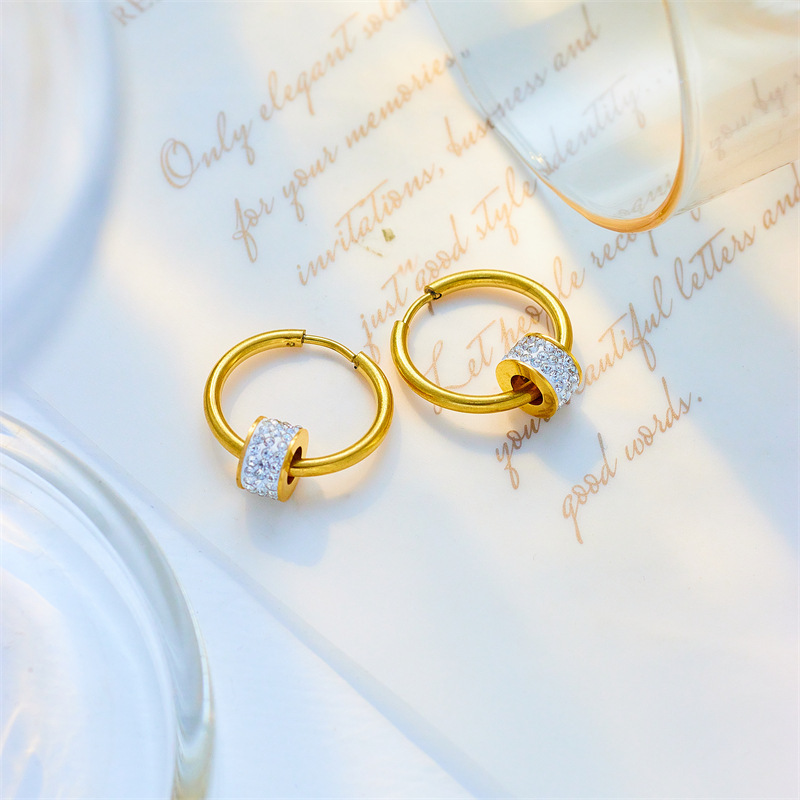 Korean-style trendy niche design, full diamond, slim waist, titanium steel rotating pendant, simple, elegant and unique earrings.