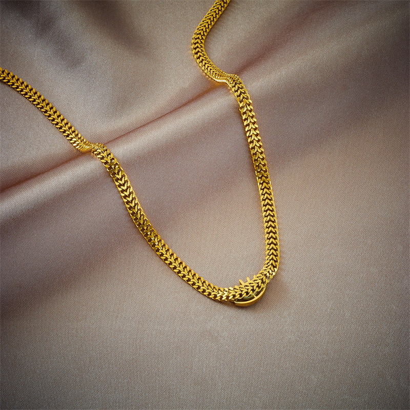 New European and American cross-border minimalist creative personalized hollowed-out blue eyes titanium steel metal chain hip-hop necklace