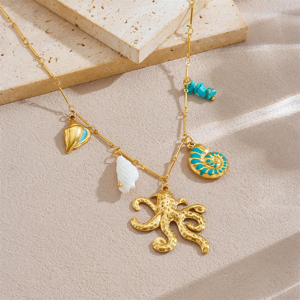 Fashionable, creative, and unique bamboo-joint delicate chain, gold-plated, oil-sprinkled blue conch, octopus, and pebble pendant necklace.