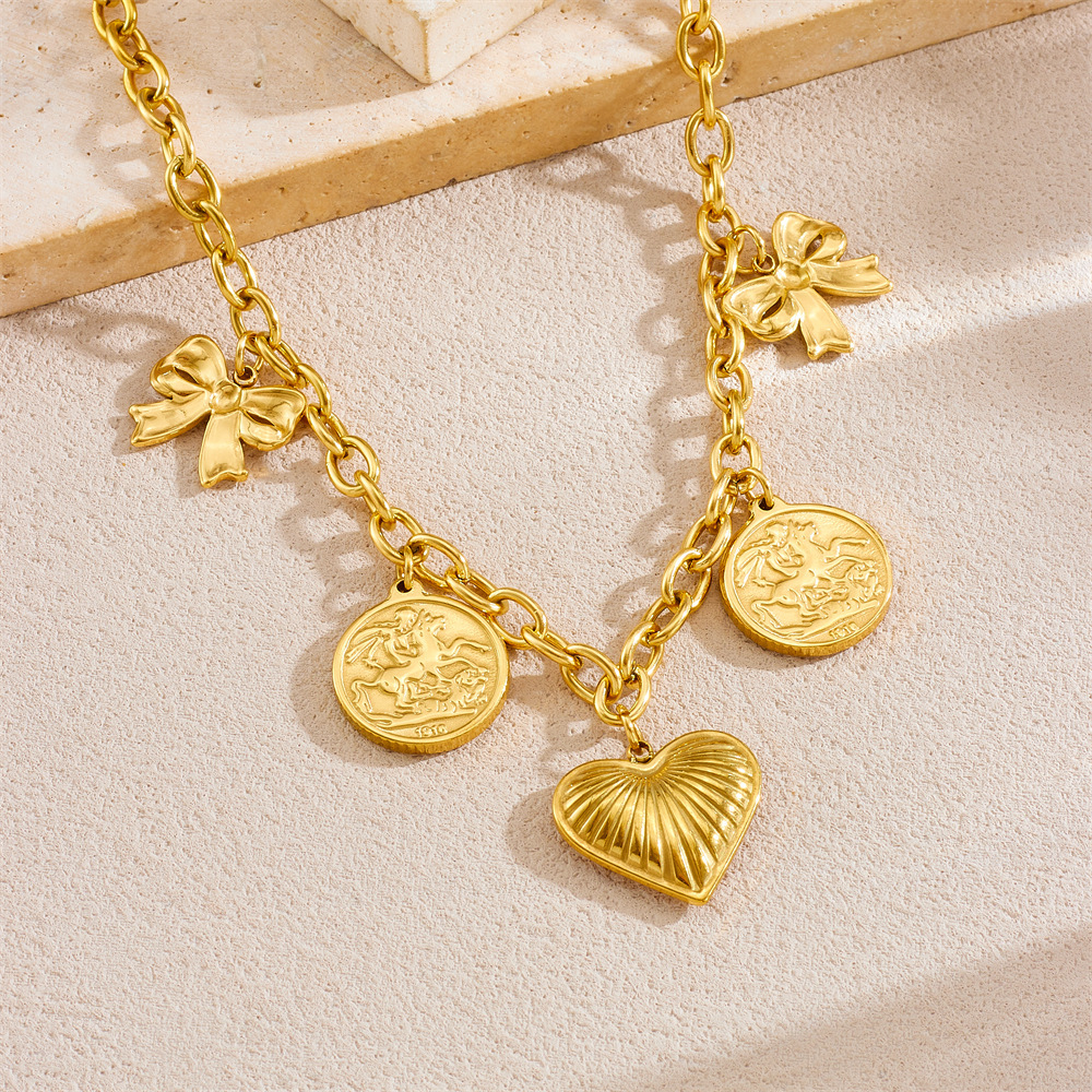 European and American retro gold-plated heavy-duty O-chain stainless steel portrait round pendant bow heart chain necklace