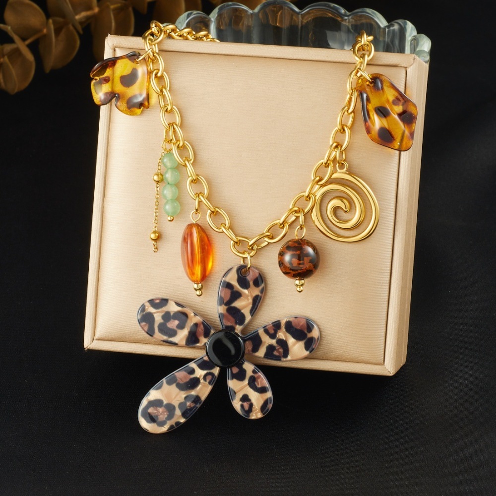 Cross-border fashion creative leopard print acrylic petal flower pendant spiral gold-plated stainless steel tassel necklace