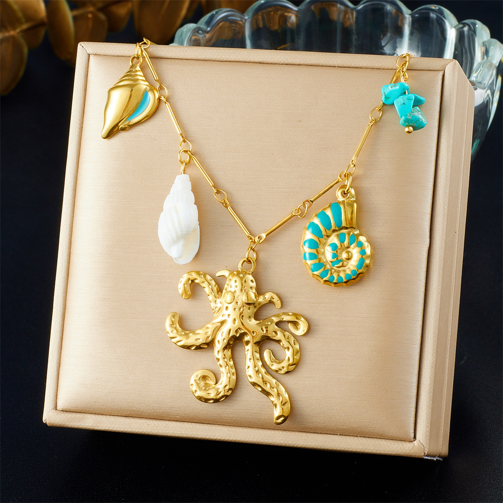 Fashionable, creative, and unique bamboo-joint delicate chain, gold-plated, oil-sprinkled blue conch, octopus, and pebble pendant necklace.