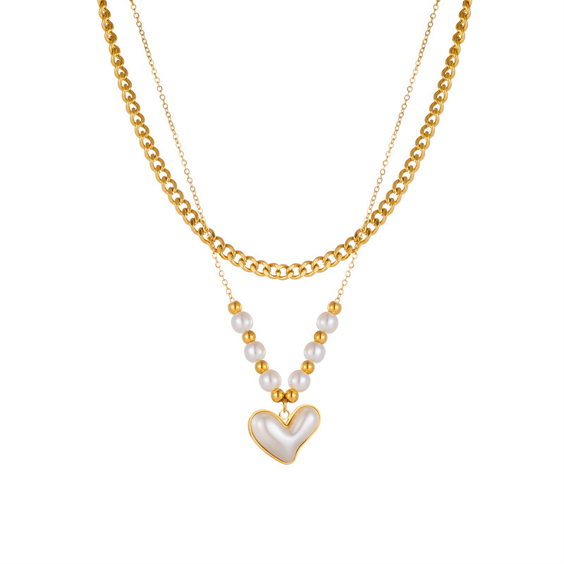 European and American style retro-style double-layer stainless steel necklace with pearl, heart, cross, and eye inlays.