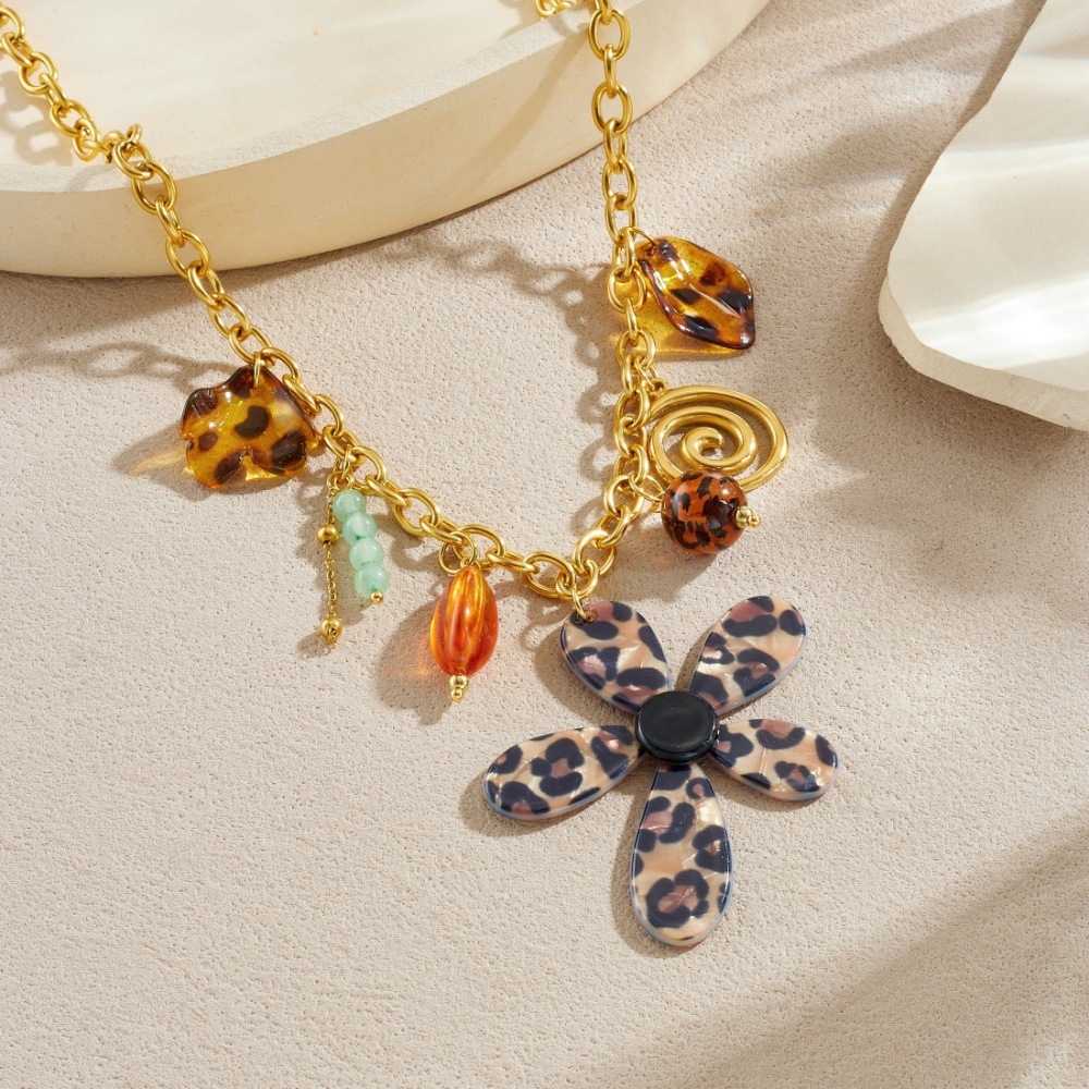 Cross-border fashion creative leopard print acrylic petal flower pendant spiral gold-plated stainless steel tassel necklace