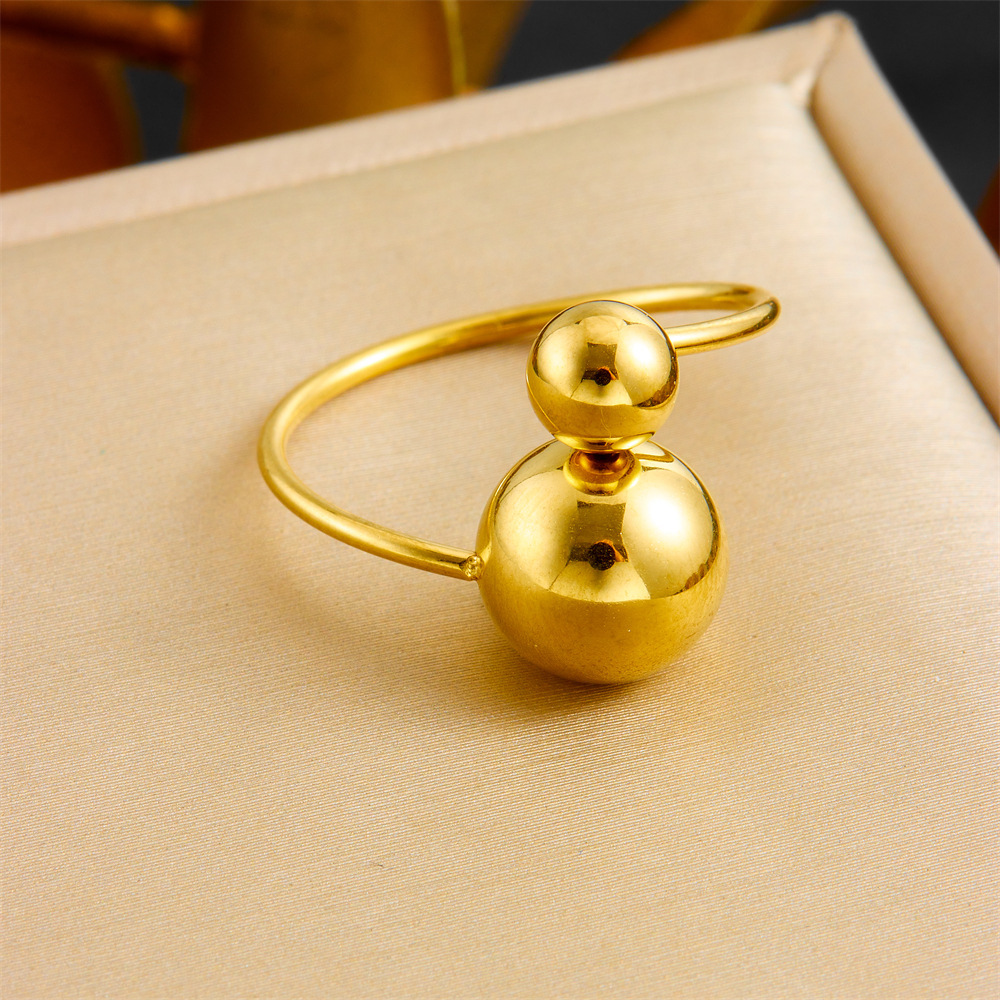 Niche, understated luxury, minimalist style, large and small round, adjustable gold-plated stainless steel thin band women's ring/band.