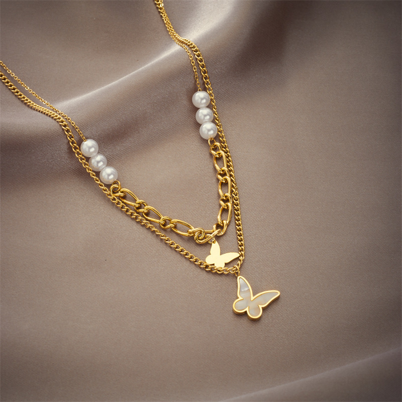 European and American style retro niche design double-layer irregular chain beaded butterfly pendant titanium steel necklace with bow