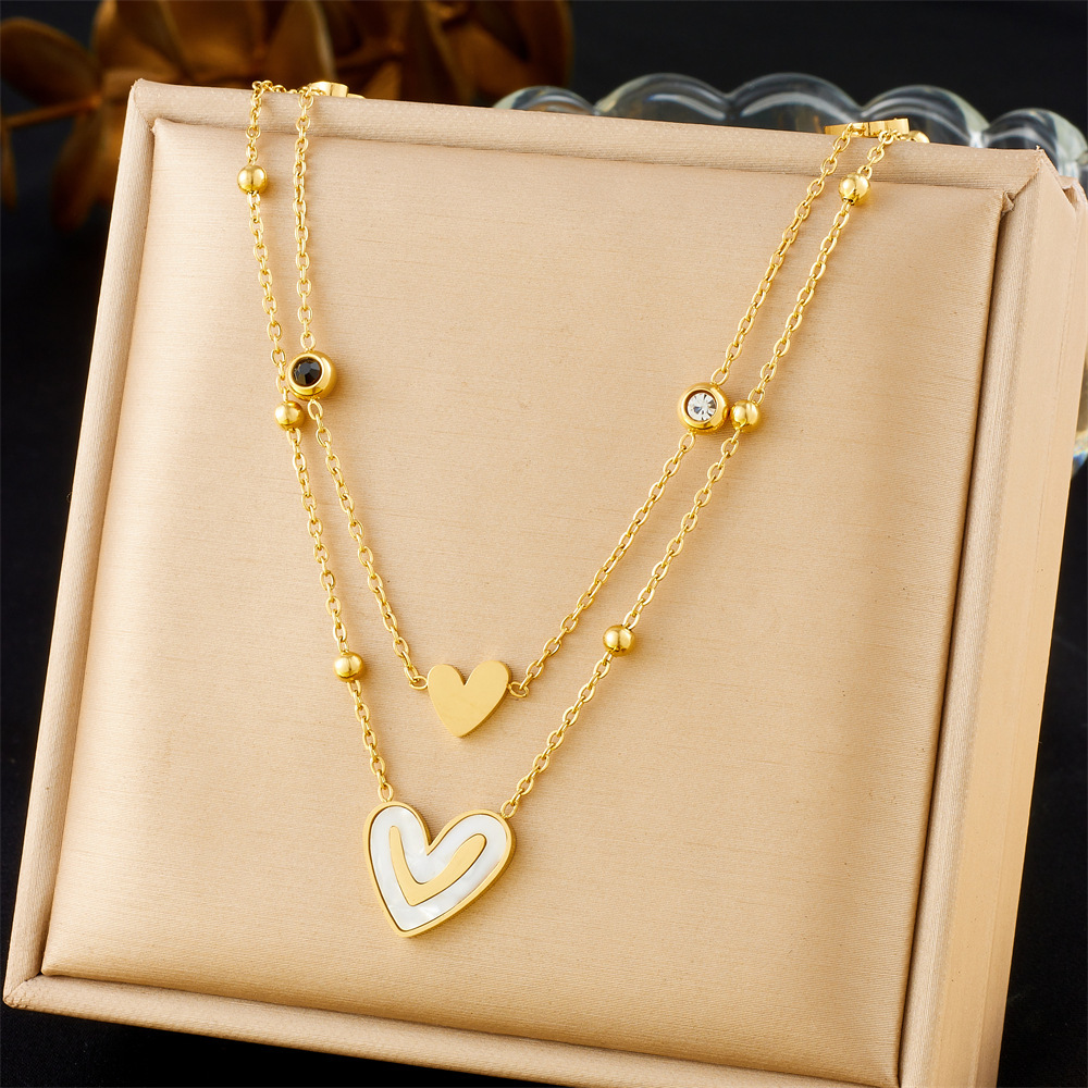 Korean-style fashionable and simple white shell heart smiley face black and white double diamond stacked multi-layer thin chain gold-plated stainless steel necklace