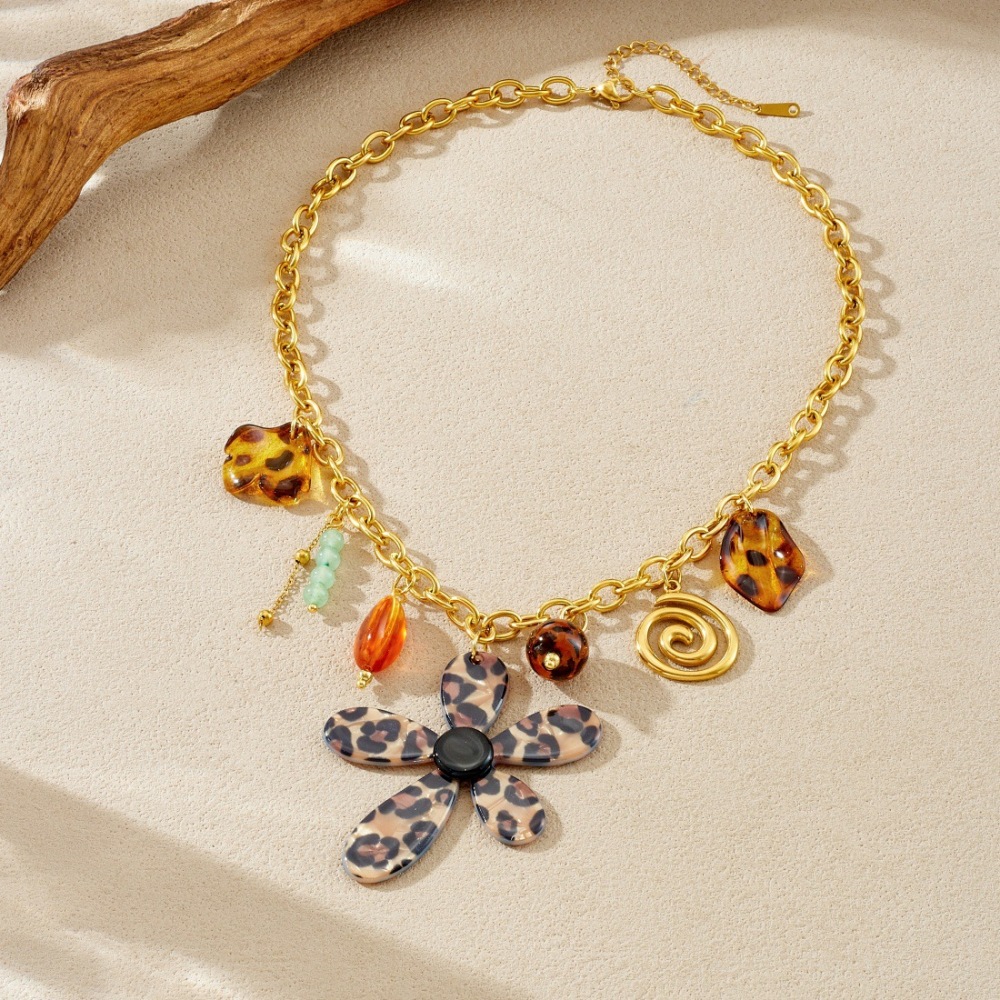 Cross-border fashion creative leopard print acrylic petal flower pendant spiral gold-plated stainless steel tassel necklace