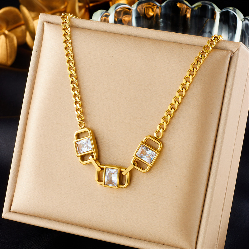 European and American style retro minimalist square necklace with emerald and rhinestone inlay and titanium steel chain.