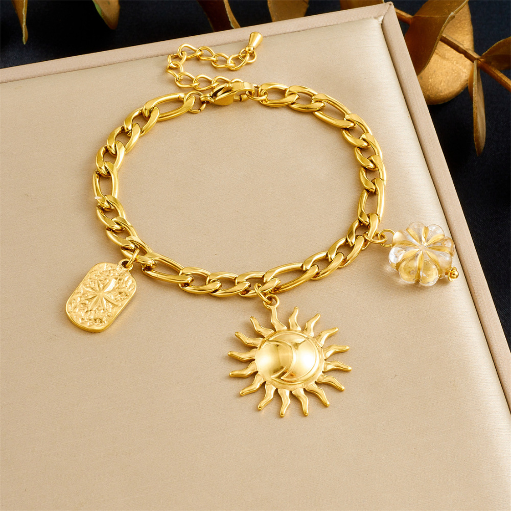 European and American cross-border fashion stainless steel bracelet and necklace set with light luxury retro sun round pendant and heart-shaped pendant for women.