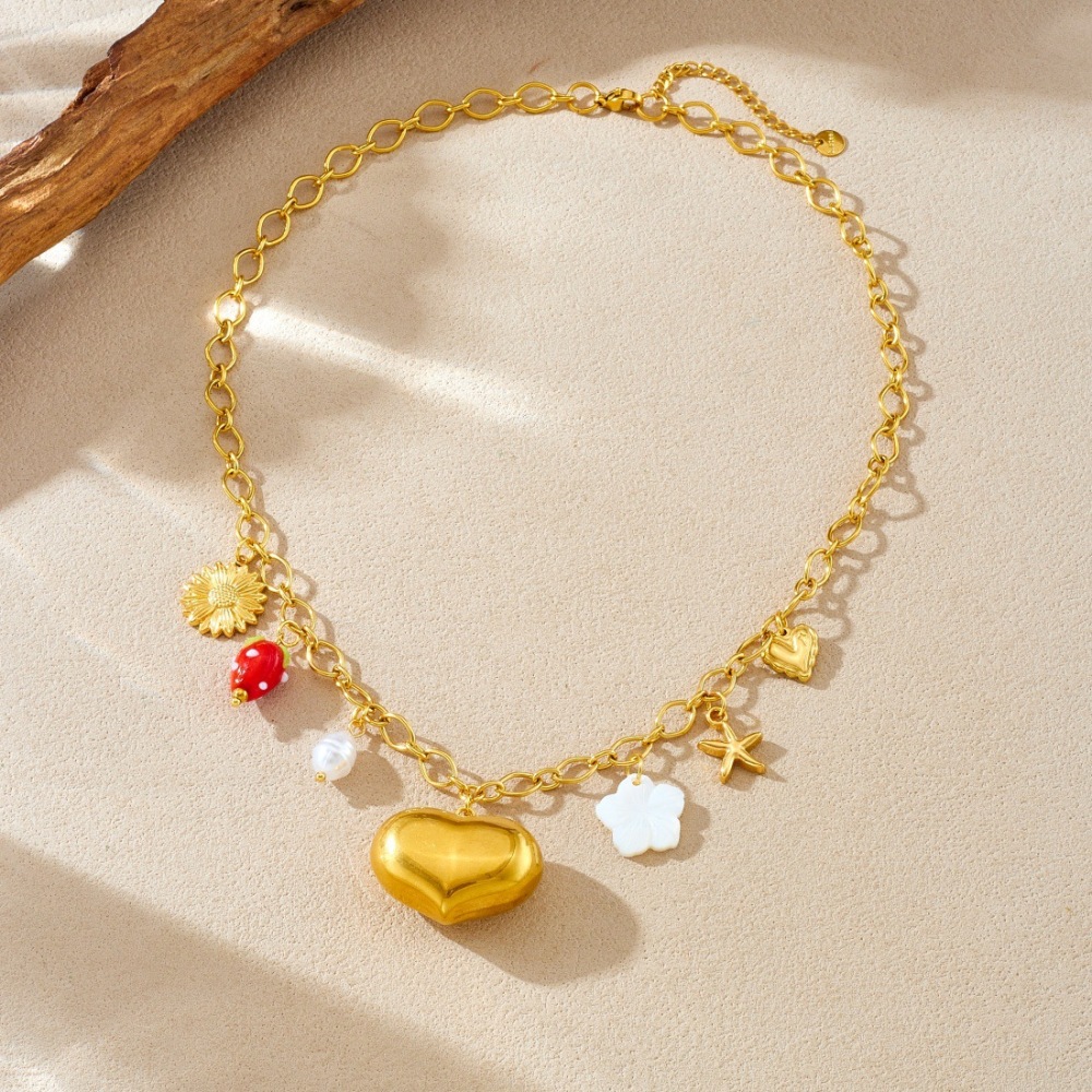 Cross-border fashion niche design gold-plated hollowed-out large heart pendant clavicle chain stainless steel sunflower starfish necklace