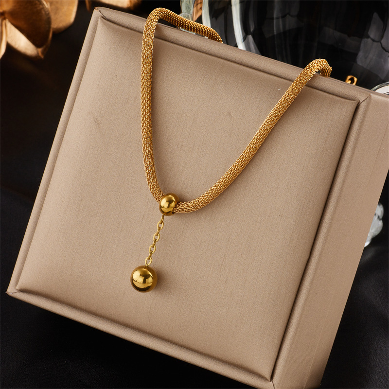 Korean-style fashionable and elegant niche design hollow cylindrical chain gold bead tassel pendant titanium steel jewelry necklace