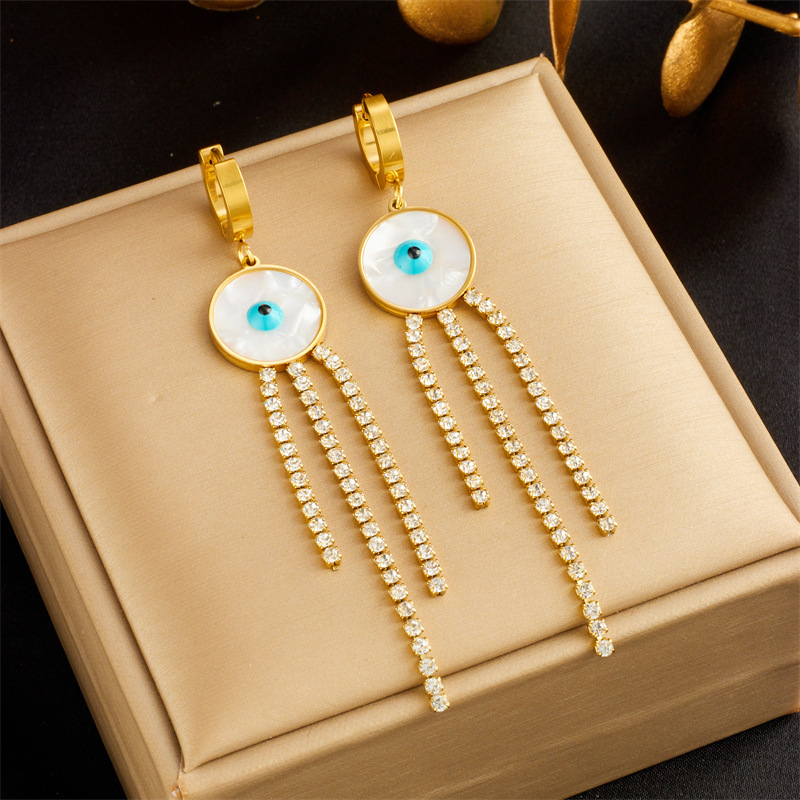 Fashionable, niche, minimalist, elegant, and subtly luxurious round seashell blue eye-shaped diamond chain tassel earrings.