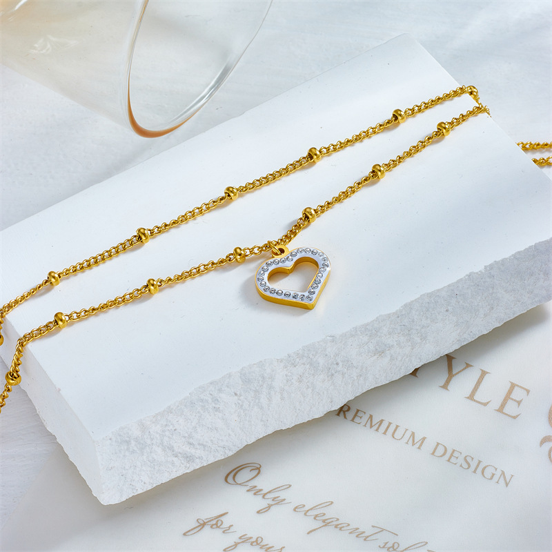 Korean style, fashionable, simple beach-inspired metal beaded double-layer chain with diamond-encrusted heart pendant, titanium steel anklet.
