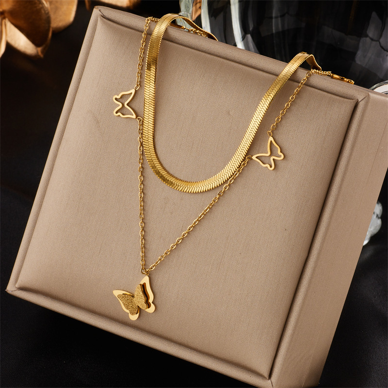 European and American style, high-end, light luxury, simple double-layered hollowed-out butterfly clavicle chain, titanium steel unique necklace.