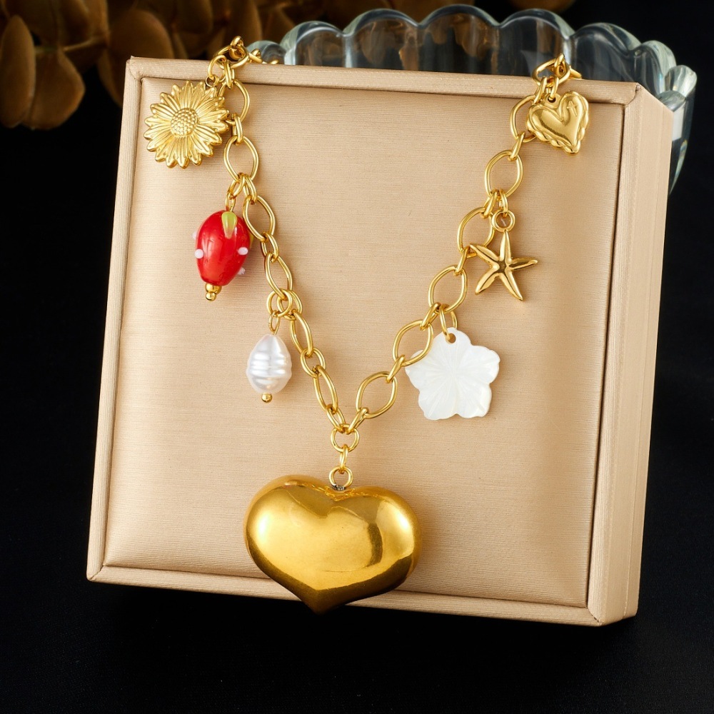 Cross-border fashion niche design gold-plated hollowed-out large heart pendant clavicle chain stainless steel sunflower starfish necklace