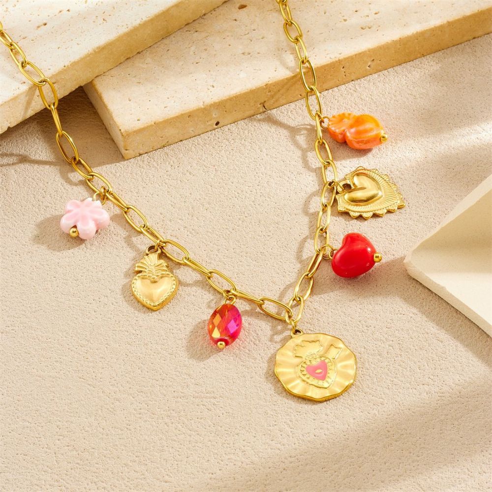 Korean-style fashionable Instagram-inspired multi-element gold-plated round pendant with irregular dripping heart and flower design, stainless steel set.