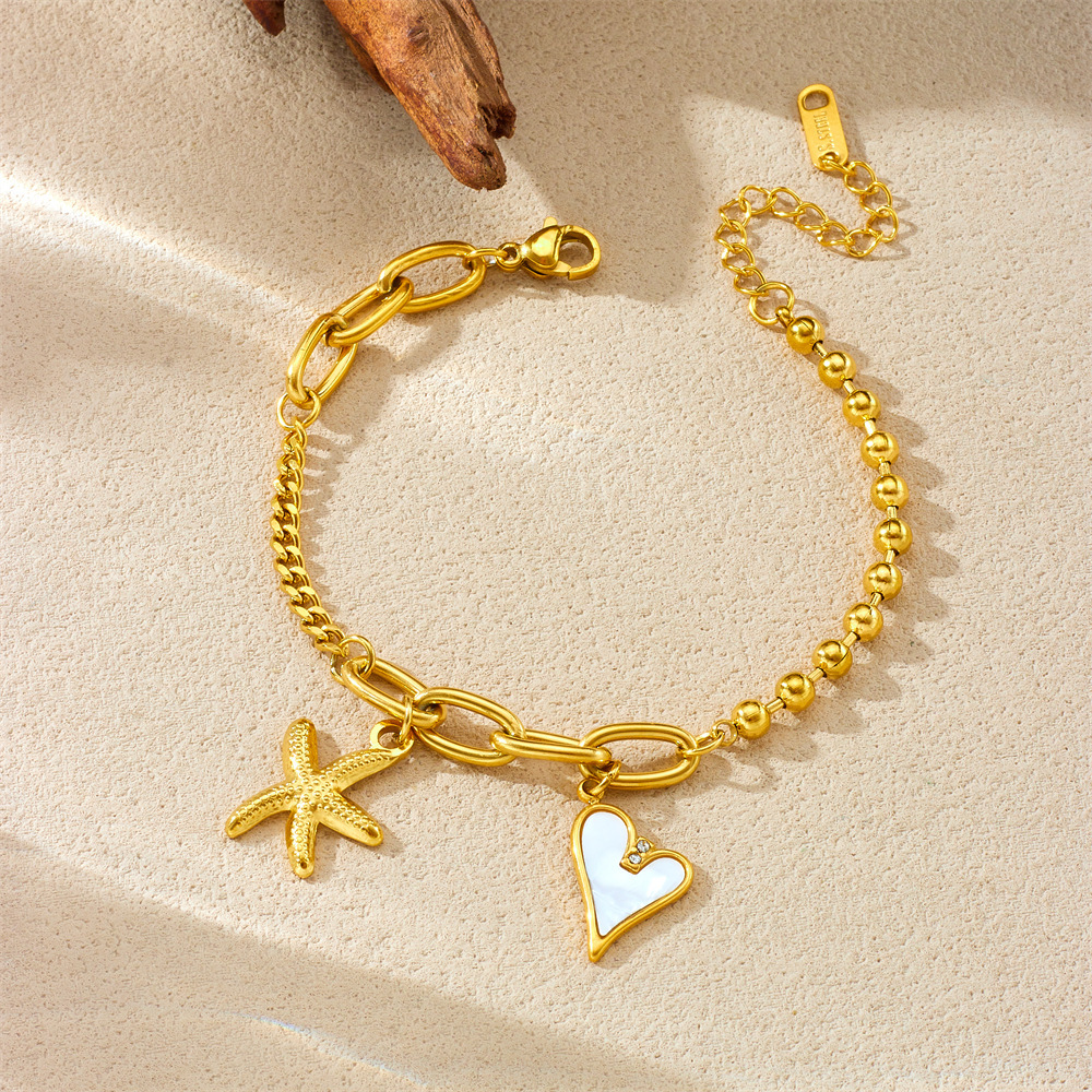 Cross-border European and American stainless steel 18K gold starfish mother-of-pearl heart pendant irregular fashion chain women's bracelet