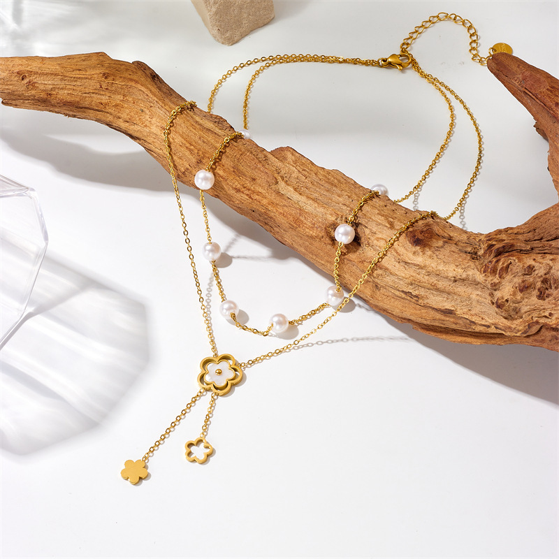 Stylish and simple double-layered pearl flower chain tassel pendant titanium steel necklace