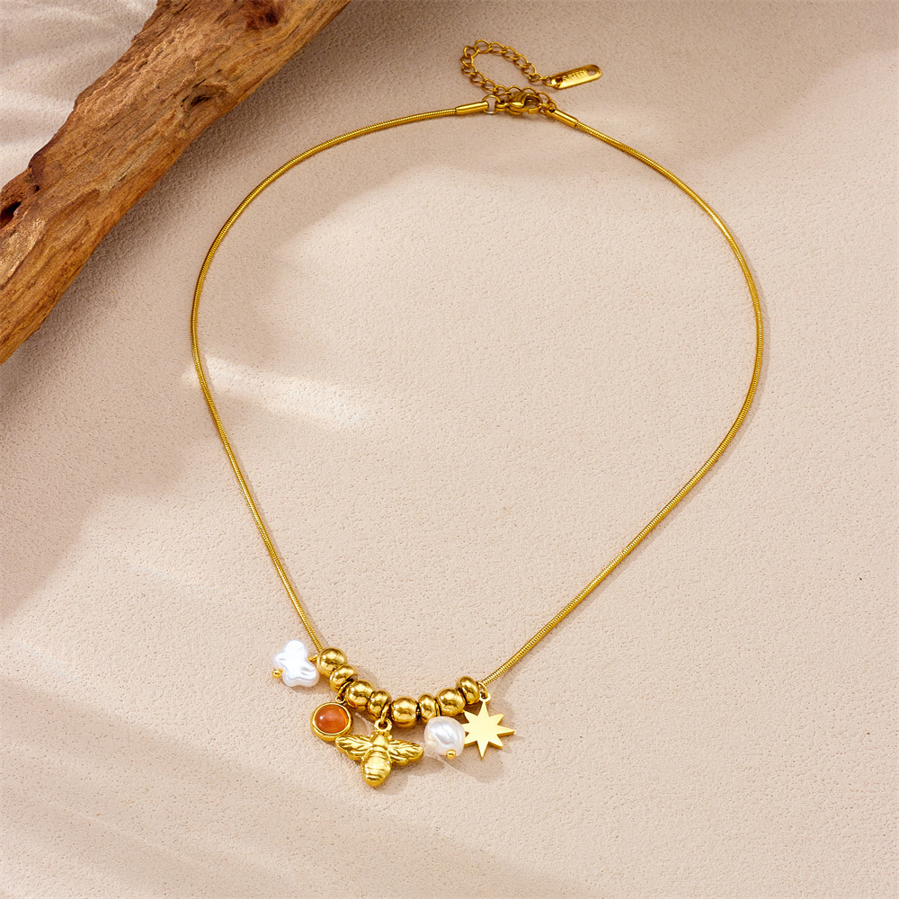 Fashionable retro creative versatile multi-element pendant stainless steel chain eight-pointed star bee pearl accessory necklace