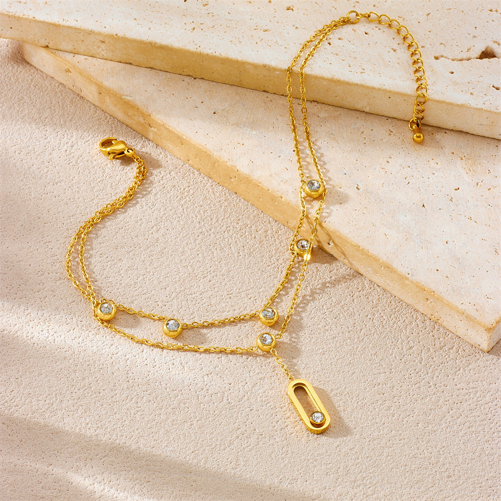 Fashionable niche design, understated luxury, high-end feel, gold-plated stackable stainless steel double-layer chain, diamond-encrusted geometric anklet