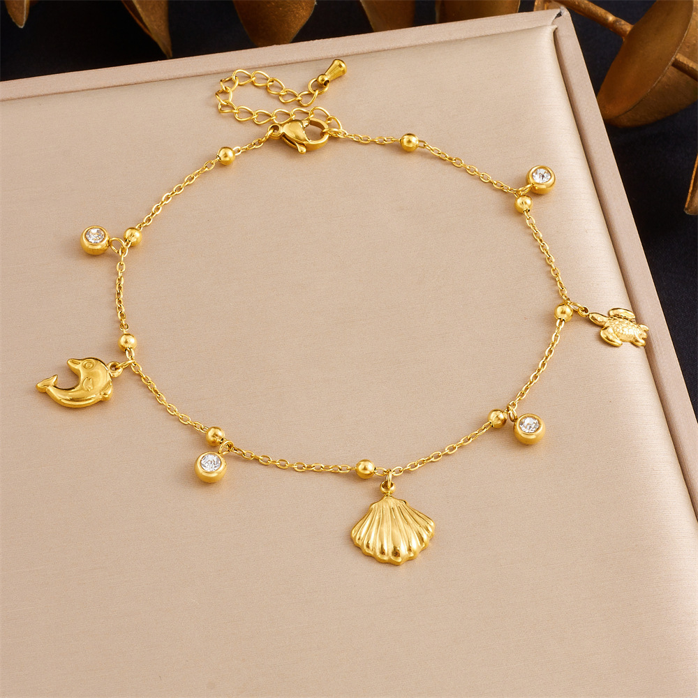 New stylish, simple, and versatile marine life pendant, gold-plated stainless steel turtle, dolphin, scallop chain anklet.