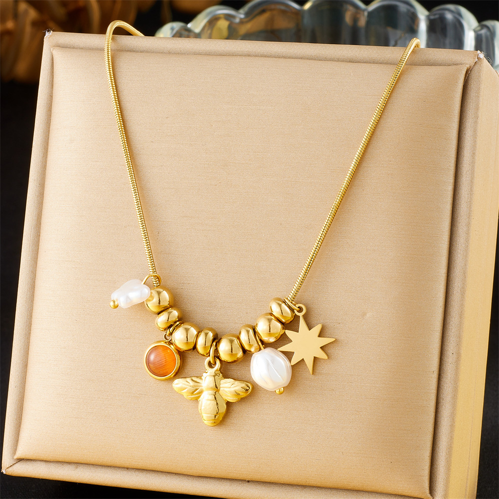 Fashionable retro creative versatile multi-element pendant stainless steel chain eight-pointed star bee pearl accessory necklace