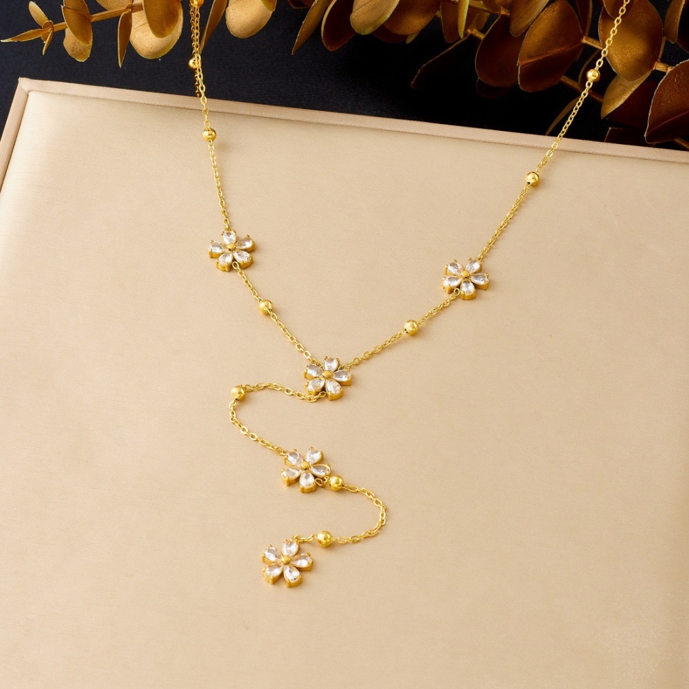 Korean style, fashionable, exquisite, simple, transparent, rhinestone-studded, flower-patterned, long tassel chain stainless steel gold-plated clavicle necklace
