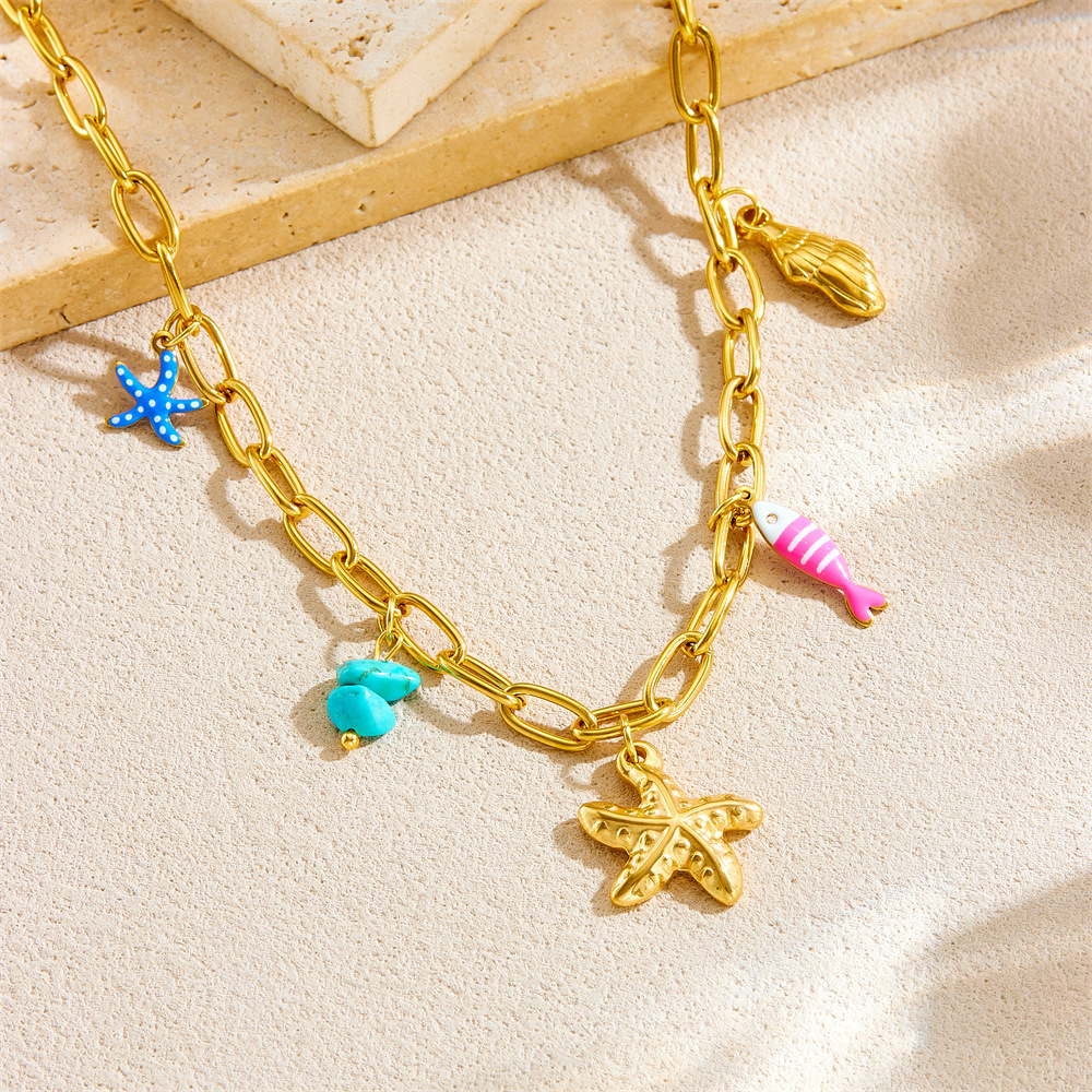 New cross-border fashion multi-element pendant necklace featuring marine life, conch, oil droplets, striped fish, polka dot starfish.