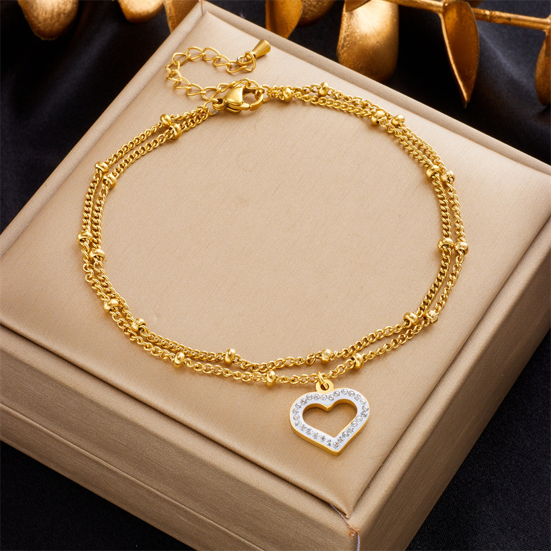 Korean style, fashionable, simple beach-inspired metal beaded double-layer chain with diamond-encrusted heart pendant, titanium steel anklet.