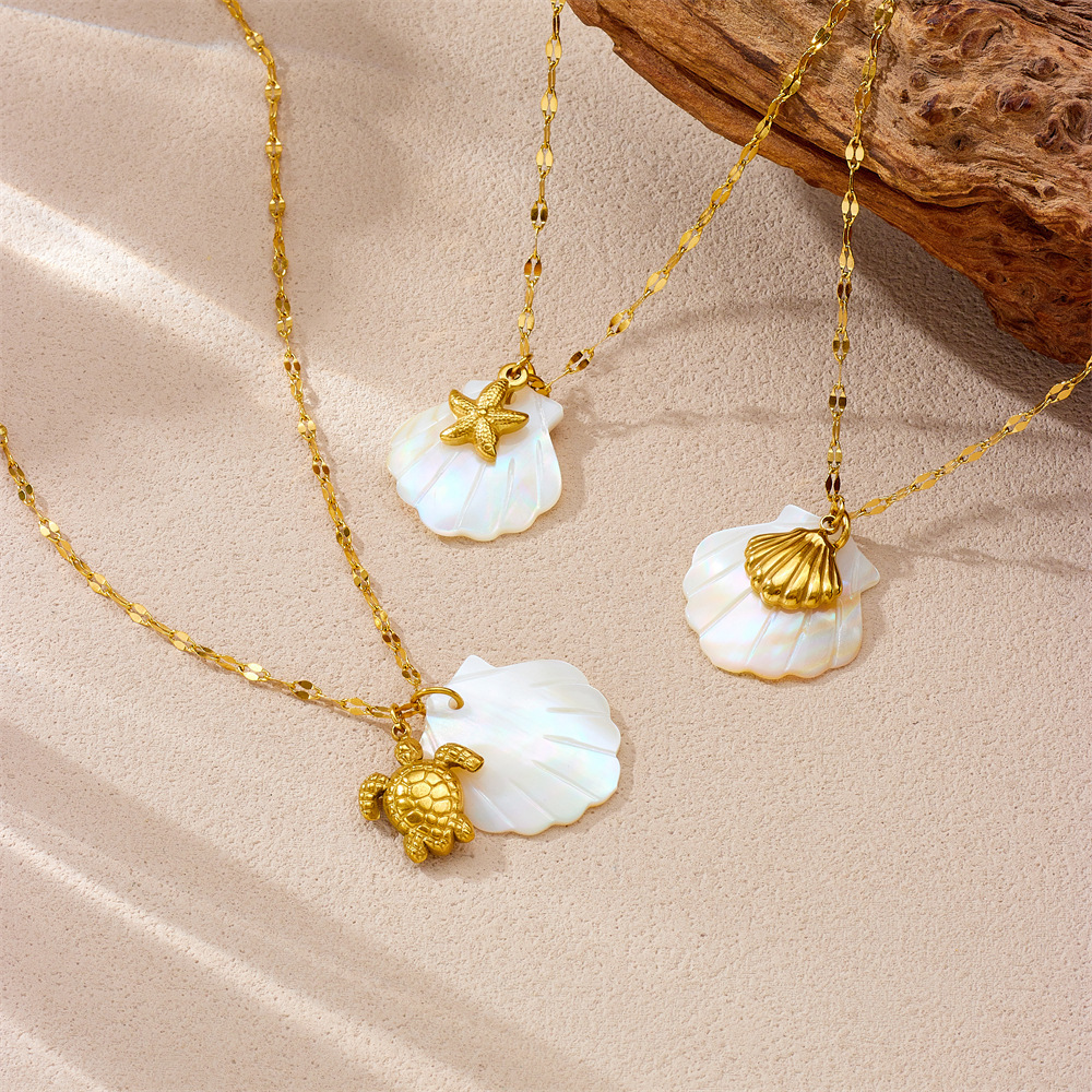 New cross-border product: Beach and ocean-themed stainless steel pendant necklace, plated with 18K gold, featuring starfish, conch shells, and sea turtles.
