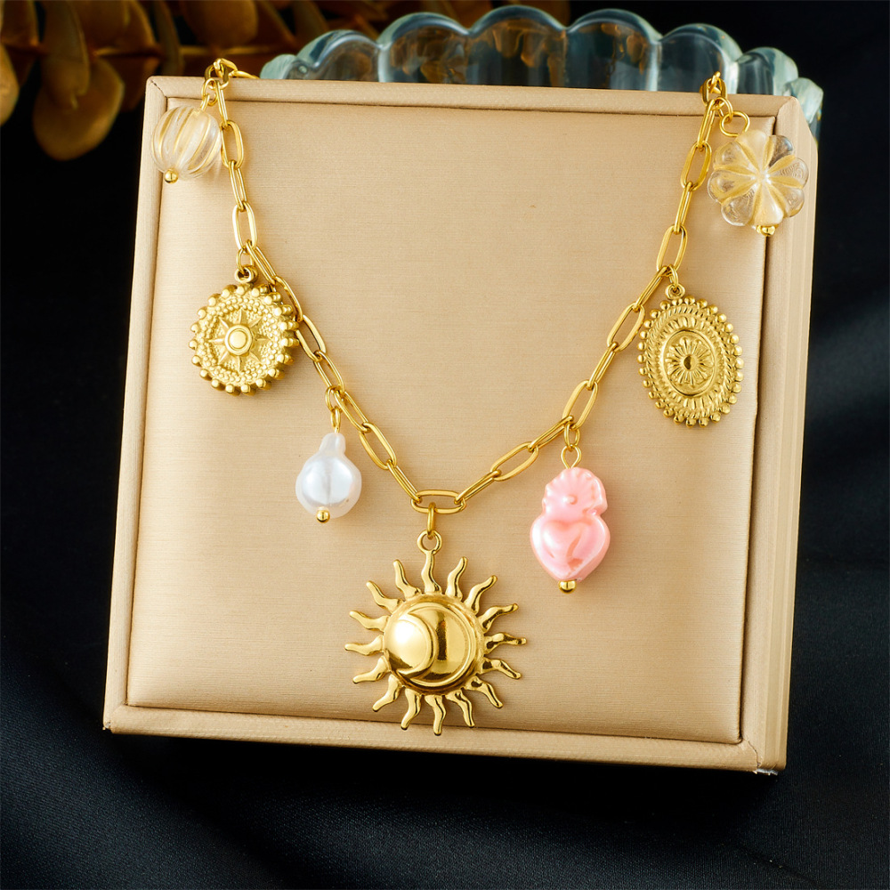 European and American cross-border fashion stainless steel bracelet and necklace set with light luxury retro sun round pendant and heart-shaped pendant for women.