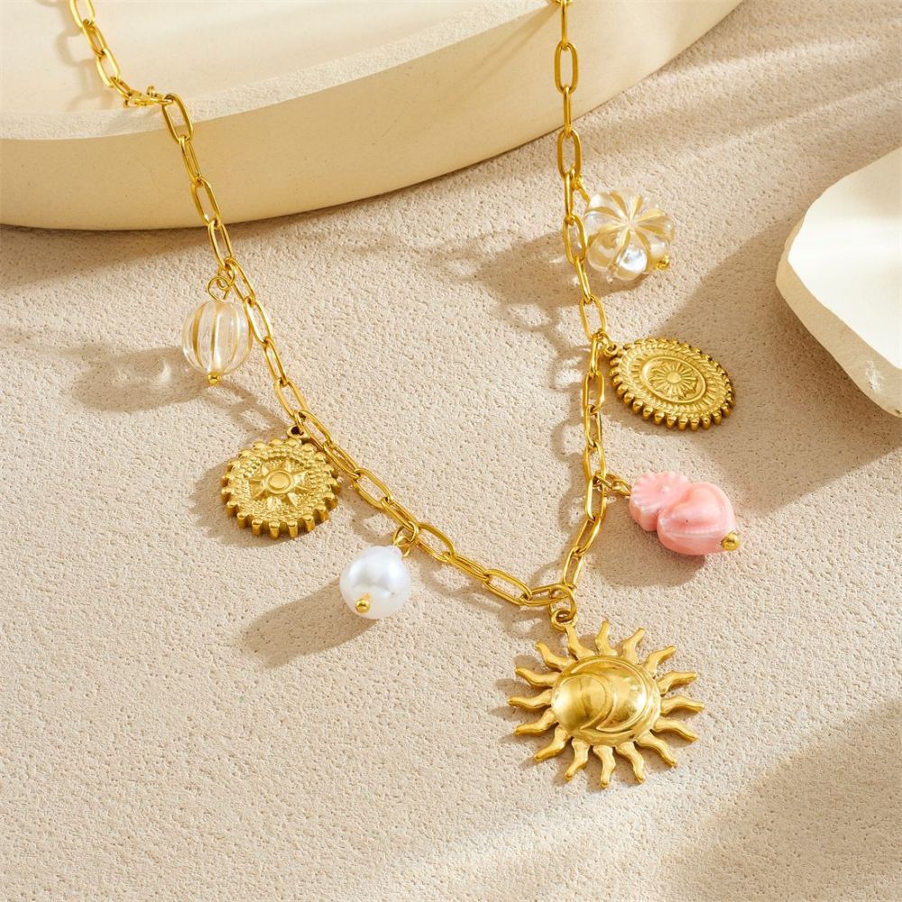 European and American cross-border fashion stainless steel bracelet and necklace set with light luxury retro sun round pendant and heart-shaped pendant for women.