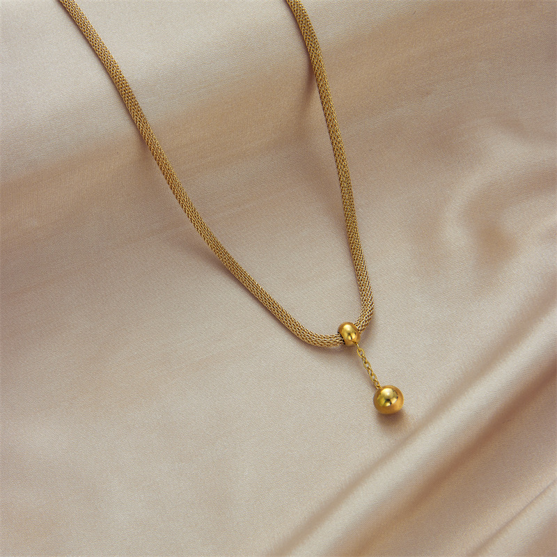 Korean-style fashionable and elegant niche design hollow cylindrical chain gold bead tassel pendant titanium steel jewelry necklace