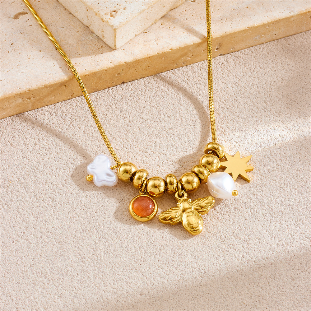 Fashionable retro creative versatile multi-element pendant stainless steel chain eight-pointed star bee pearl accessory necklace