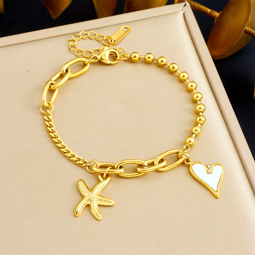 Cross-border European and American stainless steel 18K gold starfish mother-of-pearl heart pendant irregular fashion chain women's bracelet