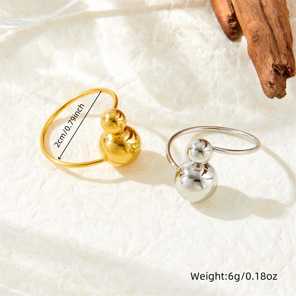 Niche, understated luxury, minimalist style, large and small round, adjustable gold-plated stainless steel thin band women's ring/band.